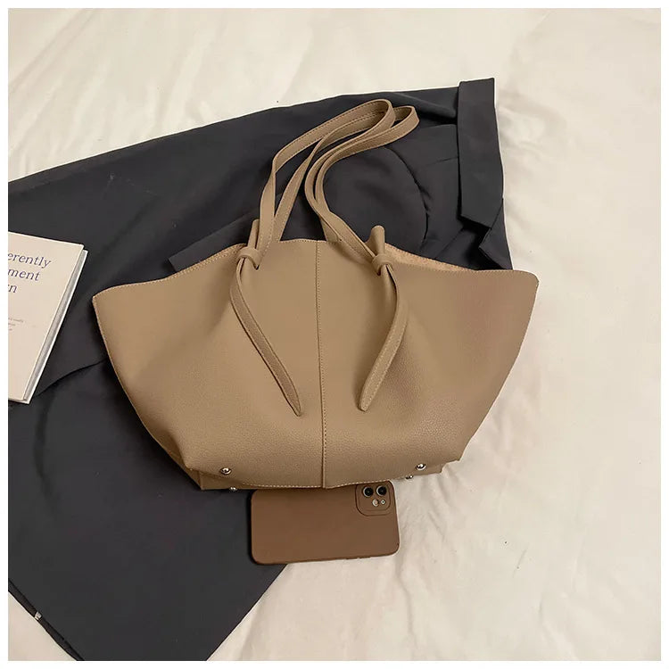 The Eden Tote — Spacious. Sophisticated. Unshakably You.
